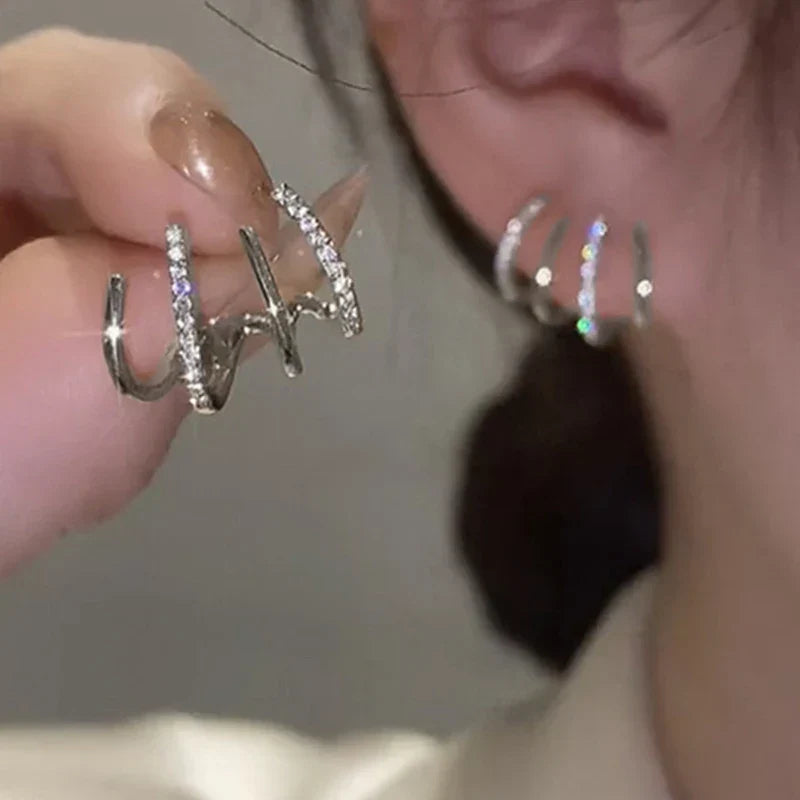 Set de Aretes de Cuatro Garras